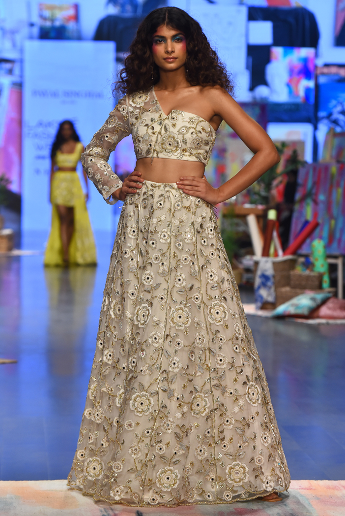 White foil embroidered one shoulder blouse and lehenga skirt set available  only at Pernia's Pop Up Shop. 2024
