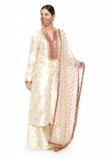 PS-KP0051  Cream Colour Banarasi Silk Kurta with Palazzo and Embroidered Banarasi Net Dupatta with Maroon Colour Brocade Patterned Detail and Matching Structured 3 Ply Mask